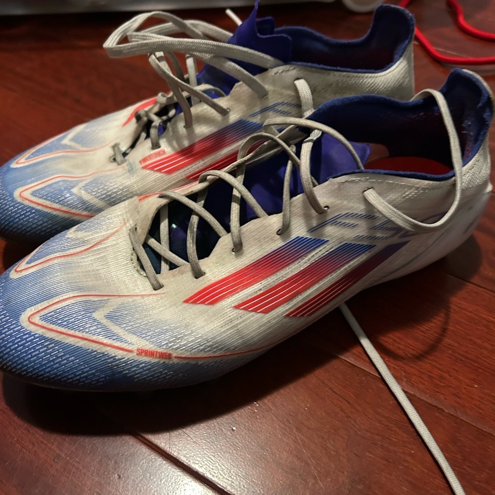 Adidas White and Blue Soccer Cleats with Red Stripes